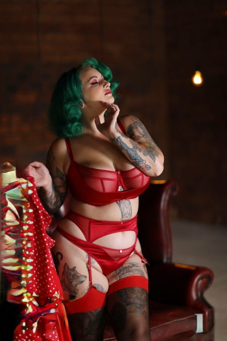 Chubby green haired babe Galda Lou reveals her melons and poses in lingerie