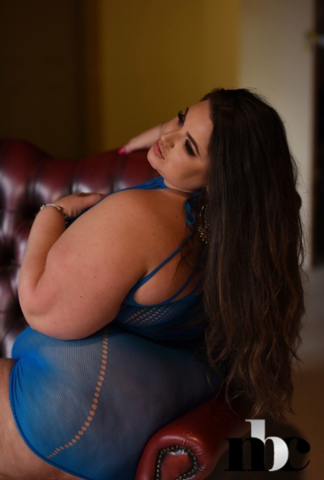 BBW Yazmin Fox, known for her breasts, takes to the stage in solo action.