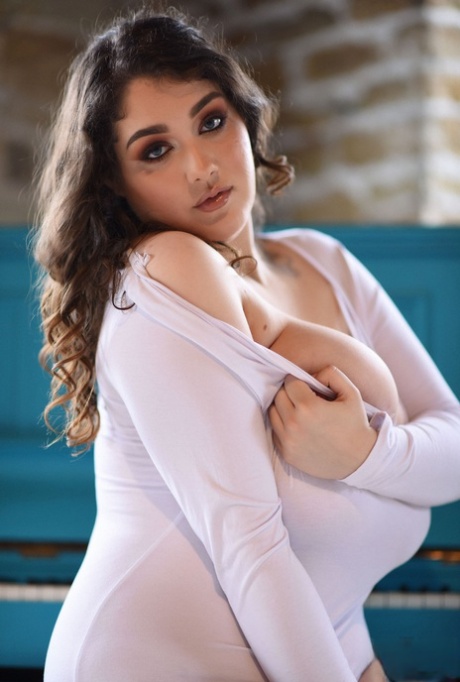 Chubby Brunette In A Bodysuit Bella B Shows Off Her Giant Natural Boobs