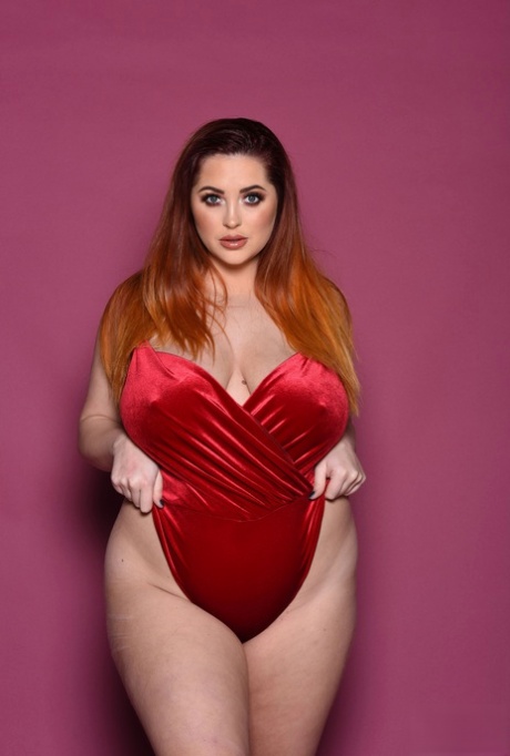 The lovely British fat lady named Lucy Vixen is admiring her well-defined natural breasts.