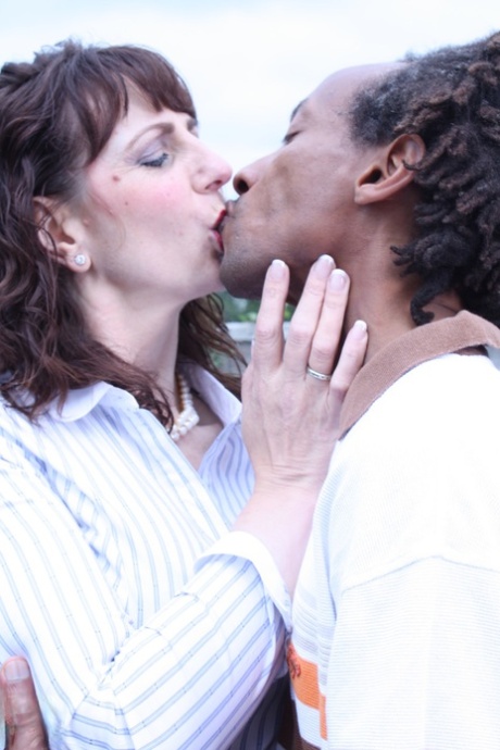 Horny British woman Toni Lace kisses a black man and rides his huge anus.