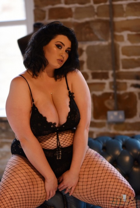 Bigger: Fat model Kiki strips off her boobs, removes all her clothes from her armhole and puts on fishnet tights.