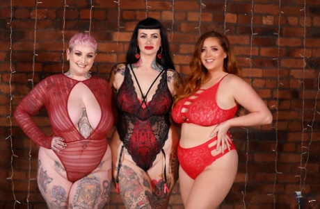 Red lingerie is worn by three hot, smoking-hot BBWs, who flaunt their monstrous curves.
