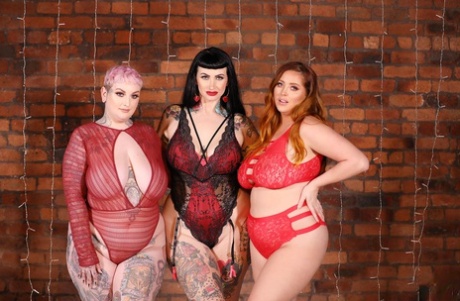 Three smoking hot BBWs bare their monster curves in red lingerie