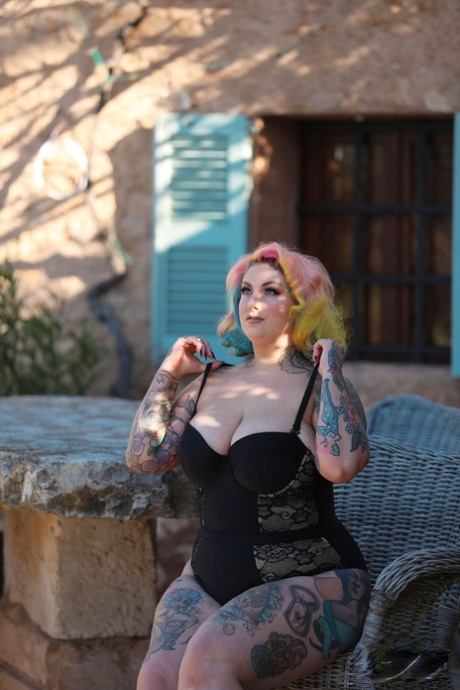 Tattooed BBW Galda Lou outside with her huge natural tits and fat buttocks.