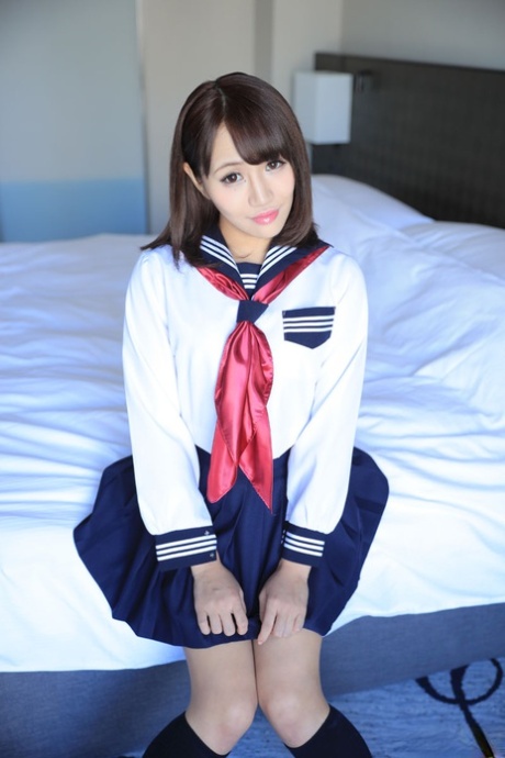 Schoolgirl Konoha Kasukabe exposes her long, hairy pussy after a cunniling.