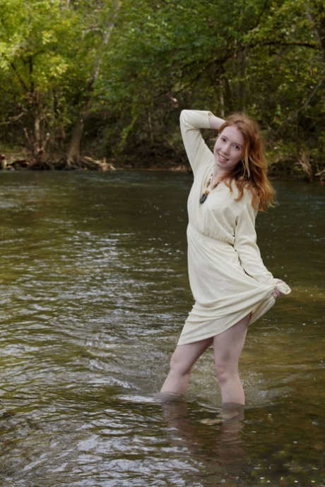 Redheaded American Pornstar Nicki Blue Reveals Her Cute Ass In The River