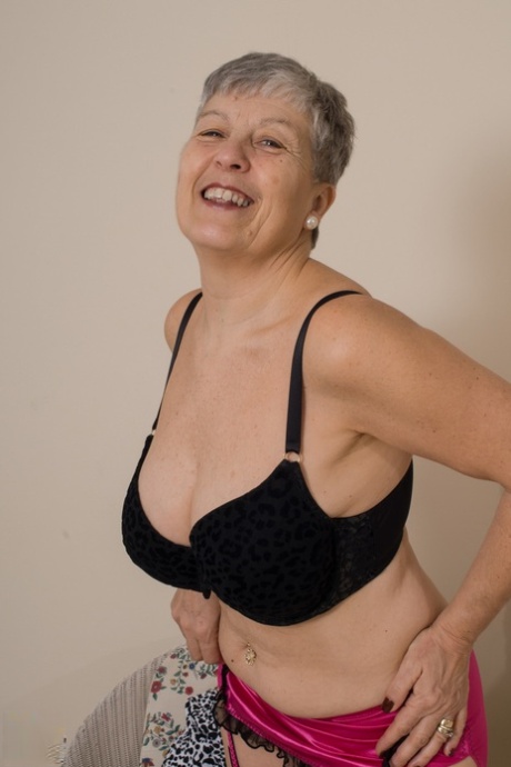 Charming Granny Savana Shows Her Big Tits And Poses In Her Sexy Lingerie