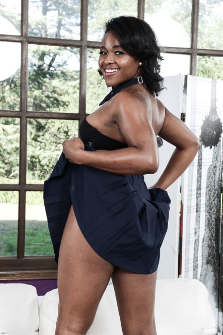 The solo act of Charlie Rae showcases her bush and pierced belly in a tiny-titted, ebony dress.