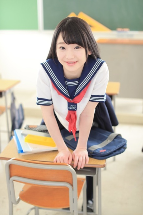 Yuna Himekawa, a charming Asian schoolgirl, spreads her legs and takes a dick in front of her classmates at school.