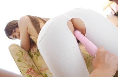 Young Asian model Ruri Tachibana is subjected to bodily pressure while wearing her ripped jeans.