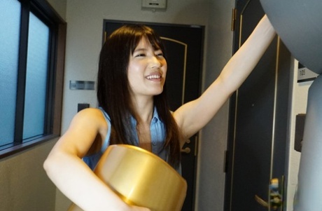 In her muff, Tomoka Nanase is an Asian brunette who strips and receives the dong.