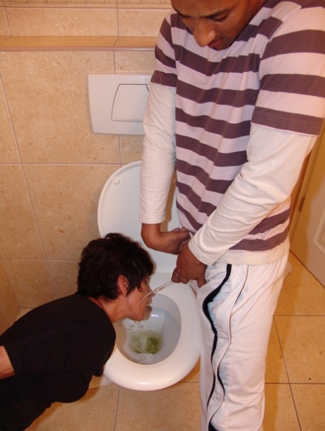 Hansah, a resident of the kinky house, drinks pee and then licks a toilet stud.