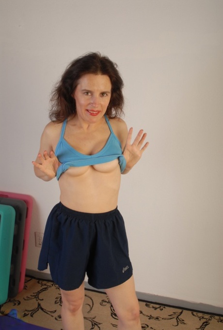 During her yoga practice, Marie Q (an amateur European wifey) exposes herself and masturbates.