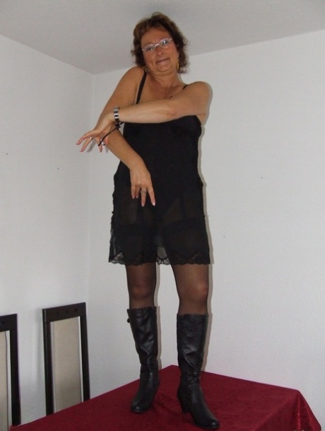 A naked kinky granny, Gabriele takes off her clothes and performs in a solo performance.