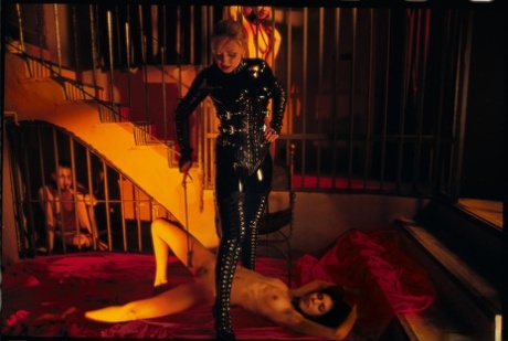 In a sensual lingerie strip, the two babies bond out in high heels while performing oral sex on their respective partners.