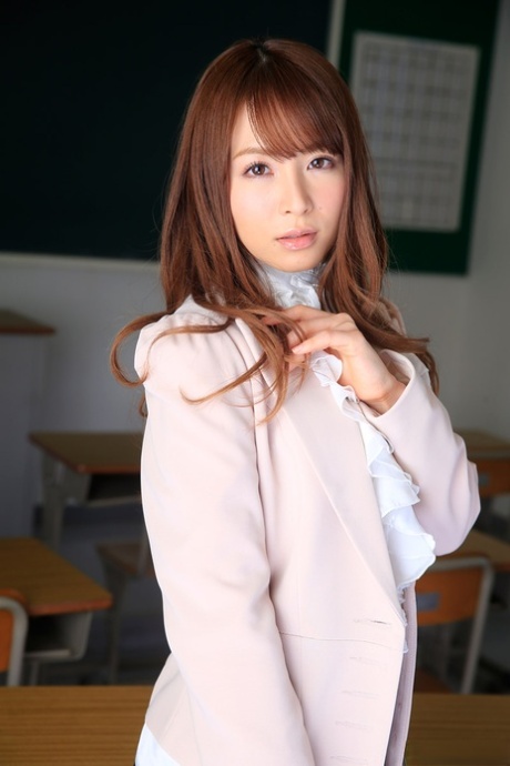 Perverted student's face is fucked by fiery Japanese teacher Miku Ohashi.