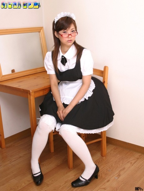 The hairy twang of Miku Hayama, an attractive Asian maid on a couch, is used to groom her.
