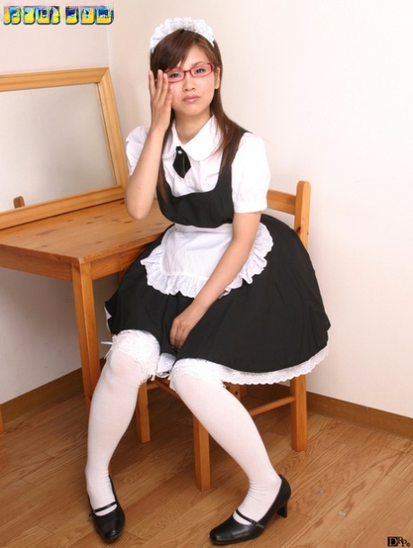 The hairy twat of an Asian maid, Miku Hayama, is drill-bitten while sitting on a couch.