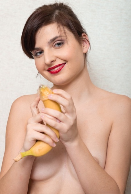 The Russian secretary Zlata was photographed at the office, with inserted bananas in her hair and vagina.