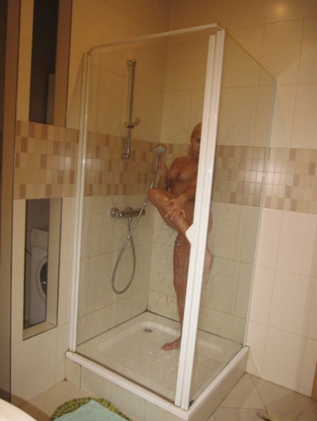 Lisa's ex-girlfriend looks dashing in the shower, flaunting her cute little fib and enviable penis.