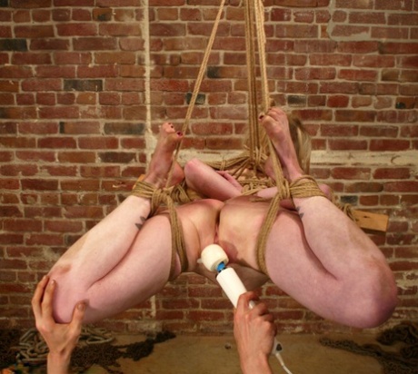 Submissive American babe Adrianna Nicole gets tied up and toyed in BDSM action