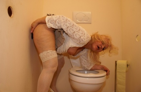 Blonde Granny MaireAnn Gets Blacked Through A Gloryhole And Enjoys A Facial