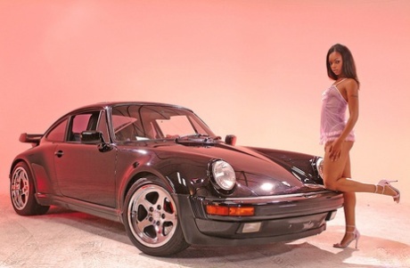 Ebony MILF Marie Luv Strips Off Her Purple Lingerie And Poses In The Porsche