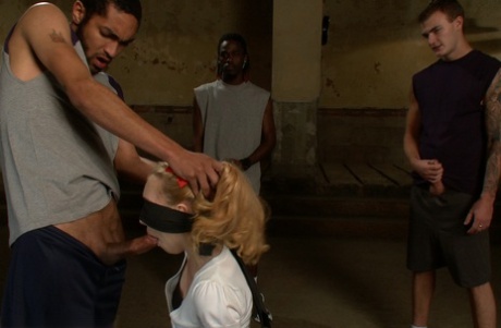 Emma Haize, a seductive cheerleader, is covered in a blindfold and forcefully gangbanged.