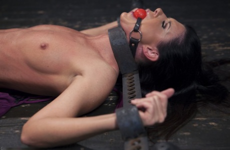 India Summer, a dark-haired pornstar, is stripped down and bound before a BDSM audition.