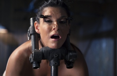 India Summer, a dark-haired pornstar, is stripped down and bound before a BDSM audition.