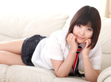 The act of performing finger fuckeds, toying, and pushing maneuvers on Yume Aoi, a young Japanese schoolgirl.