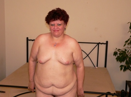 The curly, adulterated vagina of short-haired BBW Prudence is the object of a slim man's desire.