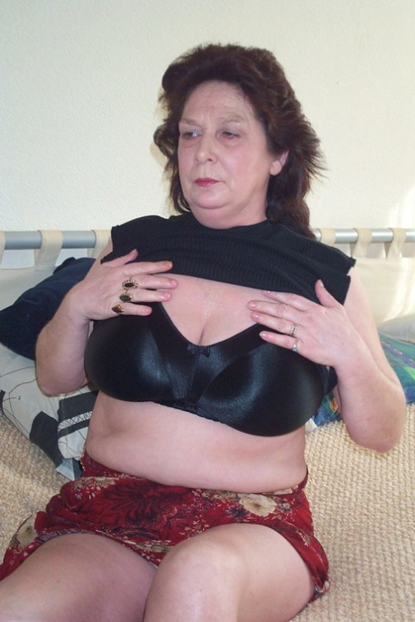Large, masturbatory and showy tits: Chubby adult Trudi (left) shows off her "big tits" or she masturbates.