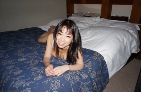 Asian Honey Asuka Presents Her Slim Figure And Small Tits On A Bed