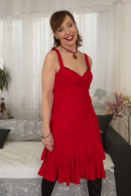 Mature Lady Danny Poses In Her Dress, Stockings & Panties & Touches Herself