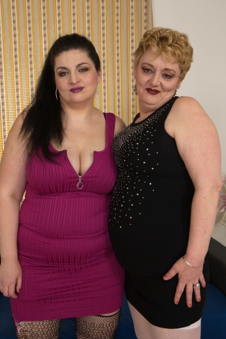 Professional BBW amateurs Lucille and Mily dressed in their seductive outfits.