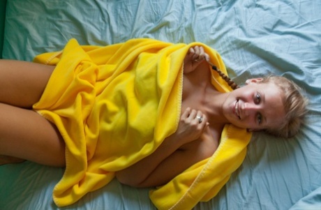 Blonde Girl With Blue Eyes Alice Wonder Covers Her Naked Body With A Blanket
