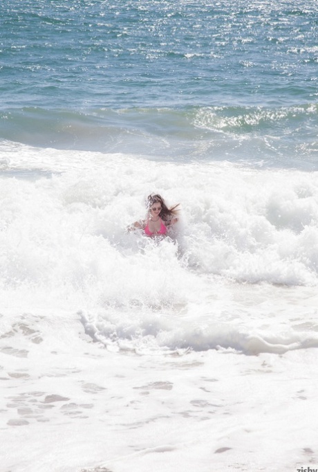 Loved one day: Pretty sweet Natalie Moore spent it on the beach enjoying herself.