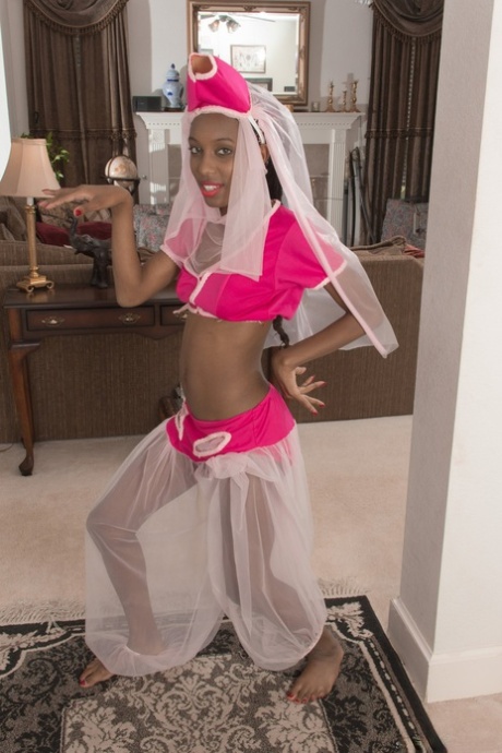 Fun Loving Ebony Harem Girl Saf Does Enticing Striptease Uncovering Her Bush