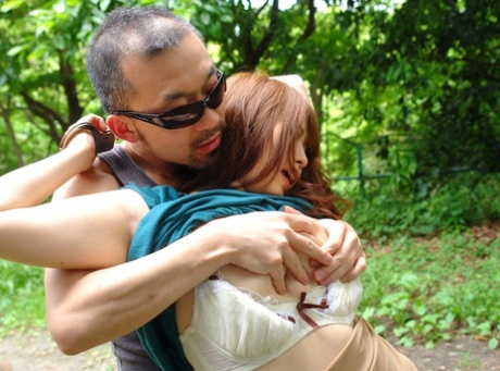 In the woods, Japanese redhead Eri Makino is attacked and engulfed.