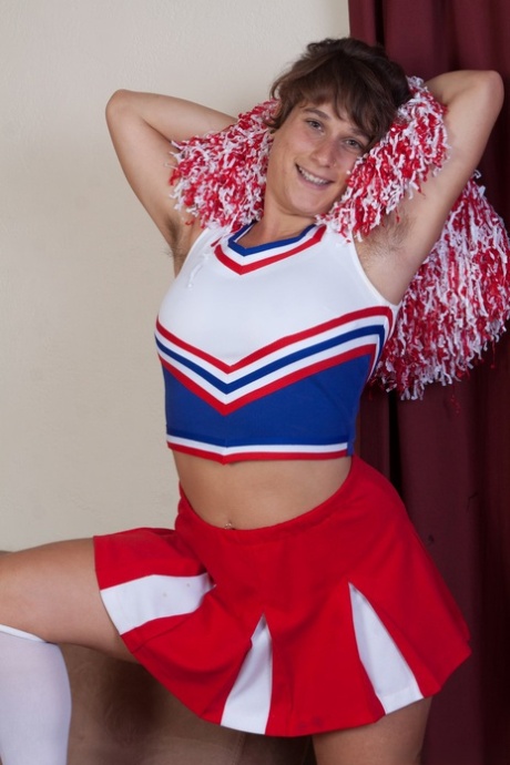 Nasty Cheerleader Sayge Poses In The Bedroom And Shows Her Muff