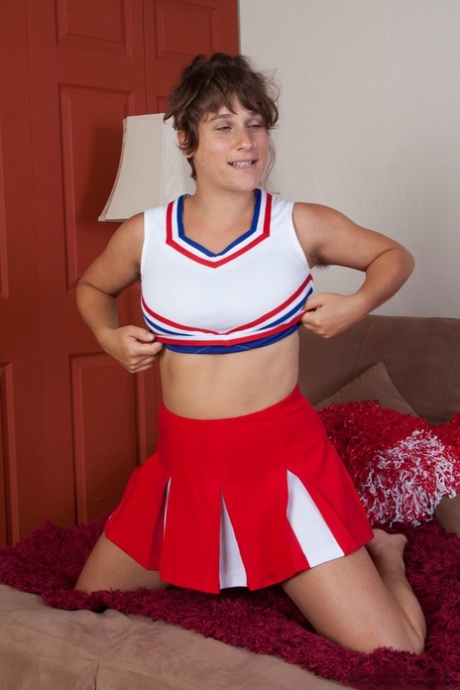 Nasty Cheerleader Sayge Poses In The Bedroom And Shows Her Muff