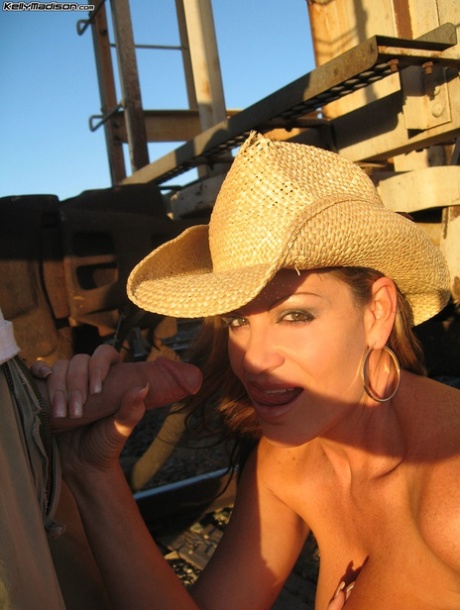 Busy MILF cowgirl undresses in the sunshine to release big tits and as well as sucking their cocks.