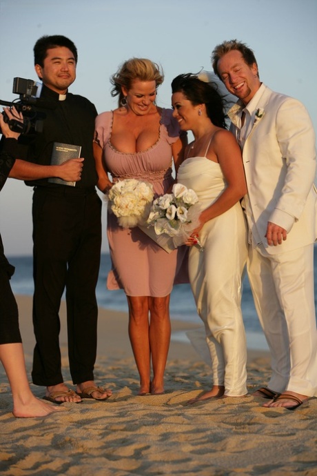 Sienna West, a brunette pornstar, and her partner Kelly on their wedding day.