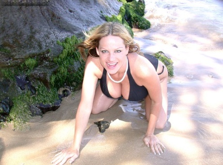 American MILF In Black Lingerie Kelly Madison Posing On The Beach