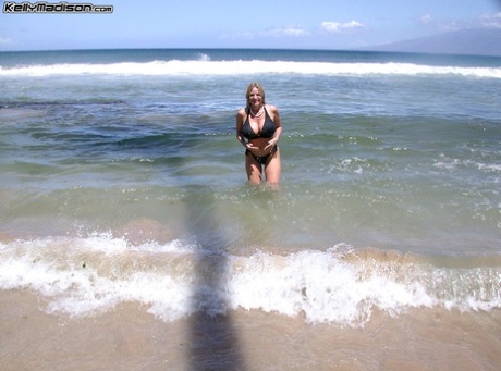 American MILF In Black Lingerie Kelly Madison Posing On The Beach