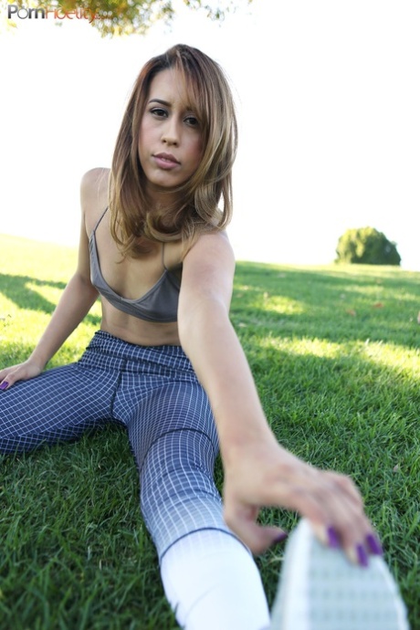 On the lawn: Exercised-out girl Demi Lopez stops to'masturbate naked in her clothes' (left) on the grass.