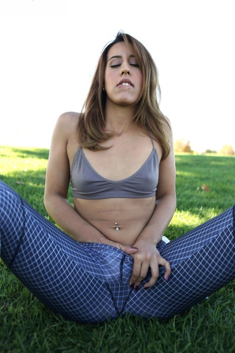 Then Demi Lopez stops to masturbate on the lawn while doing her exercise, and she has a pussy in the buff.