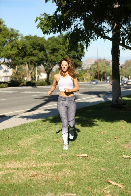 Resting on the grass while exercising, Demi Lopez uses her upper body to prostrate a pussy in good form.